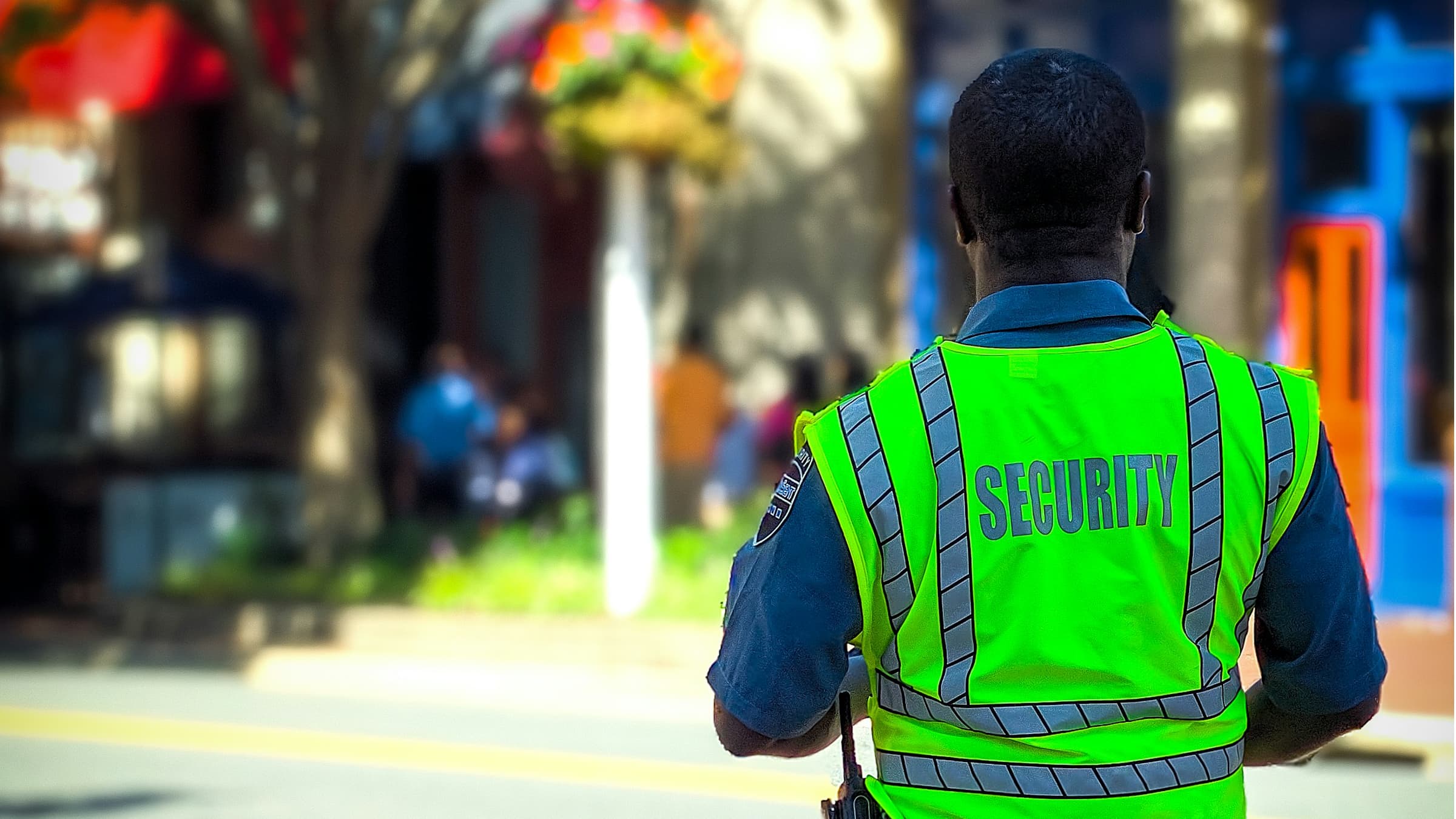 City guards walking along a street